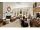 Bright and airy living room featuring a fireplace, comfortable seating, and elegant decor at 6 Judith St, Charleston, SC 29403