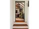 Cozy living room showcases wood floors, exposed beams, comfortable seating, and an inviting atmosphere at 6 Judith St, Charleston, SC 29403