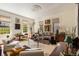Bright living room with traditional furnishings, fireplace and large windows at 6 Judith St, Charleston, SC 29403