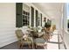 Relaxing porch area with comfortable wicker seating and an inviting atmosphere perfect for outdoor enjoyment at 6 Judith St, Charleston, SC 29403