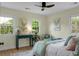 Bright bedroom with ample natural light and a ceiling fan at 7 Chadwick Dr # A, Charleston, SC 29407