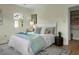 Serene bedroom with soft hues, large window, and comfortable bed at 7 Chadwick Dr # A, Charleston, SC 29407