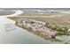 Luxury condos with amenities like tennis courts and swimming pools are surrounded by lush marshland at 74 Mariners Cay Dr, Folly Beach, SC 29439
