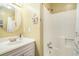 Cozy bathroom includes round mirror and walk-in shower at 74 Mariners Cay Dr, Folly Beach, SC 29439