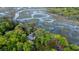 Secluded waterfront property featuring a charming home surrounded by lush greenery and private docks for ultimate relaxation at 8374 Chisolm Plantation Rd, Edisto Island, SC 29438