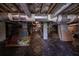 Unfinished basement, providing ample storage space, with exposed beams and ductwork at 8374 Chisolm Plantation Rd, Edisto Island, SC 29438