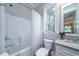 Bathroom with a shower-tub combo and a granite countertop vanity at 8374 Chisolm Plantation Rd, Edisto Island, SC 29438