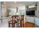 Kitchen featuring a breakfast bar with granite countertops and stainless steel appliances at 8374 Chisolm Plantation Rd, Edisto Island, SC 29438