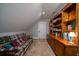 Cozy living room area with bookshelves, and natural light from the window at 8374 Chisolm Plantation Rd, Edisto Island, SC 29438