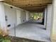 Covered patio featuring a concrete floor, and outdoor seating area at 8374 Chisolm Plantation Rd, Edisto Island, SC 29438