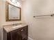 Bathroom featuring a vanity with a light-colored countertop and a decorative framed mirror at 8409 Hidden Bakers Trce, North Charleston, SC 29418