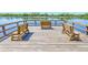 Wooden dock featuring three benches perfect for relaxing by the water at 8409 Hidden Bakers Trce, North Charleston, SC 29418