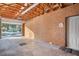 Unfinished garage providing an open space for parking and potential customization at 8409 Hidden Bakers Trce, North Charleston, SC 29418