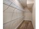 Spacious walk-in closet with carpet and multiple wire racks for optimal storage, offering functionality and organization at 8409 Hidden Bakers Trce, North Charleston, SC 29418