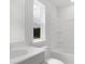 Clean bathroom featuring a bathtub, sink, and toilet at 1023 Swamp Rose Run, Summerville, SC 29485