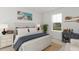 Comfortable bedroom with nautical-themed decor, ample natural light, and stylish furnishings at 1023 Swamp Rose Run, Summerville, SC 29485
