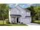 Charming two-story home with light blue siding and a welcoming front porch at 1023 Swamp Rose Run, Summerville, SC 29485