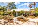 Beautiful low country home with meticulous landscaping and a walkway leading to the inviting front entrance at 1025 Riverland Woods Pl # 106, Charleston, SC 29412