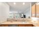 Bright kitchen features stainless steel appliances and a pass-through to the living room at 1025 Riverland Woods Pl # 106, Charleston, SC 29412