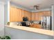 Bright kitchen featuring stainless steel appliances, light wood cabinets and plenty of counter space at 1025 Riverland Woods Pl # 106, Charleston, SC 29412
