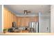 Kitchen features stainless appliances, light wood cabinets and ample counter space at 1025 Riverland Woods Pl # 106, Charleston, SC 29412