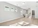 Spacious loft featuring hardwood flooring, multiple windows, and access to the bathroom at 104 Hawthorne Landing Dr, Goose Creek, SC 29445