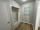 Bright bathroom features a tub and shower combo with updated fixtures and a window at 1070 French Quarter Creek Rd, Huger, SC 29450