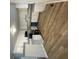 Bright kitchen features white cabinets, granite countertops and new flooring at 1070 French Quarter Creek Rd, Huger, SC 29450