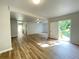 Large living area with wood flooring offering an open floor plan and abundant natural light at 1070 French Quarter Creek Rd, Huger, SC 29450