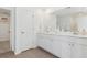 Bright bathroom showcases dual vanities, modern fixtures, and neutral tones, creating a serene and functional space at 108 Moscato Ln, Summerville, SC 29485