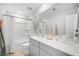 This bathroom features a light wall color, a bath tub and shower combo, and a large mirror at 109 Moscato Ln, Summerville, SC 29485