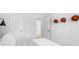 This bedroom features a light wall color, a view to the hallway and basketballs for decor at 109 Moscato Ln, Summerville, SC 29485