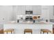 Bright kitchen features a granite island with seating and stainless steel appliances at 109 Moscato Ln, Summerville, SC 29485