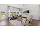 Cozy living room with stylish furniture, natural light, and a view of the backyard at 109 Moscato Ln, Summerville, SC 29485