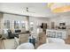 Open-concept living room with a modern kitchen, comfortable seating, and a great view at 108 Moscato Ln, Summerville, SC 29485