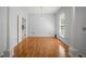 Spacious foyer with hardwood floors, fresh paint, and a view into other rooms at 114 Shadowmoss Pkwy, Charleston, SC 29414