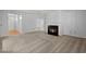 Spacious living room featuring a fireplace, carpeting, and great natural light at 114 Shadowmoss Pkwy, Charleston, SC 29414