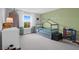 Modern bedroom with stylish bed frame, playful decor, and natural light, creating a cozy and inviting space at 114 W Bradford Pointe Dr, Summerville, SC 29483