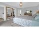 Tranquil main bedroom features a plush bed, closet, and an ensuite bathroom, providing a private retreat at 114 W Bradford Pointe Dr, Summerville, SC 29483