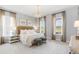 Serene bedroom with neutral tones, natural light, and stylish furnishings at 122 Moscato Ln, Summerville, SC 29485