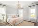 Serene bedroom with neutral tones, a comfortable bed, and plenty of natural light at 126 Maritime Way, Summerville, SC 29485