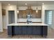 Beautiful kitchen featuring a large island with a sink, light countertops, and stainless steel appliances at 139 Summerwind Dr, Summerville, SC 29486