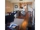 Open-concept living room with kitchen view and modern decor at 14 Lockwood Dr # 1-F, Charleston, SC 29401