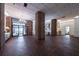 Open and spacious lobby with brick columns, herringbone floors, and grand entryway at 14 Lockwood Dr # 1-F, Charleston, SC 29401