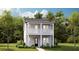 Charming two-story home with a welcoming front porch and a second-story balcony at 1425 Clay Field Trl, Summerville, SC 29485