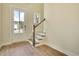 Inviting foyer features hardwood floors and a staircase leading to the upper level at 1425 Clay Field Trl, Summerville, SC 29485