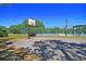 Community basketball court and pool provide opportunities for exercise and enjoyment at 1725 Henley Ln, Charleston, SC 29412