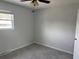 Bedroom with gray carpet and walls features a window with blinds at 1735 Boone Hall Dr # K6, Charleston, SC 29407