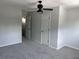 Bedroom with a gray carpet and neutral colored walls with two white doors at 1735 Boone Hall Dr # K6, Charleston, SC 29407