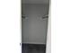 Bedroom closet with gray carpeting and two shelves with clothing rods at 1735 Boone Hall Dr # K6, Charleston, SC 29407